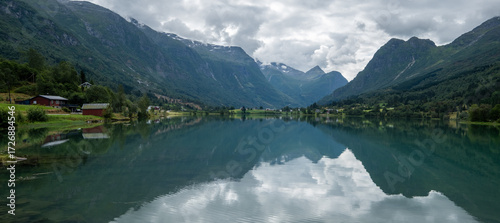 Εκτύπωση καμβά Amazing sky reflecting in Lake Floen in Olden in Nordfjord, Norway