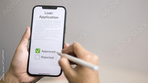 Photos Loan application approved on smartphone, digital lending and mobile credit appro