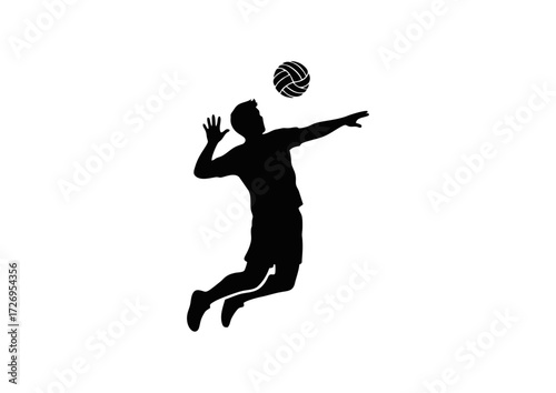 Silhouette of a volleyball player spiking the ball.