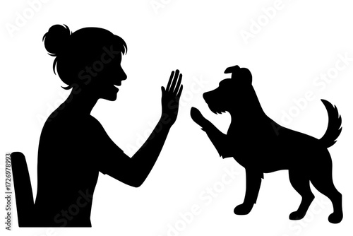 Woman silhouette training dog to give paw, high-five gesture on white