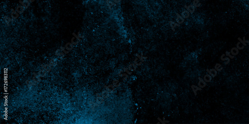 Cyan color scattered heavy grunge texture, blue grey dark background of school blackboard colored texture, abstract navy blue grunge texture or black background.
