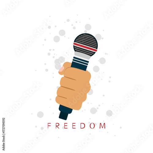 A person holds a microphone in his hand as a symbol of freedom of speech.
