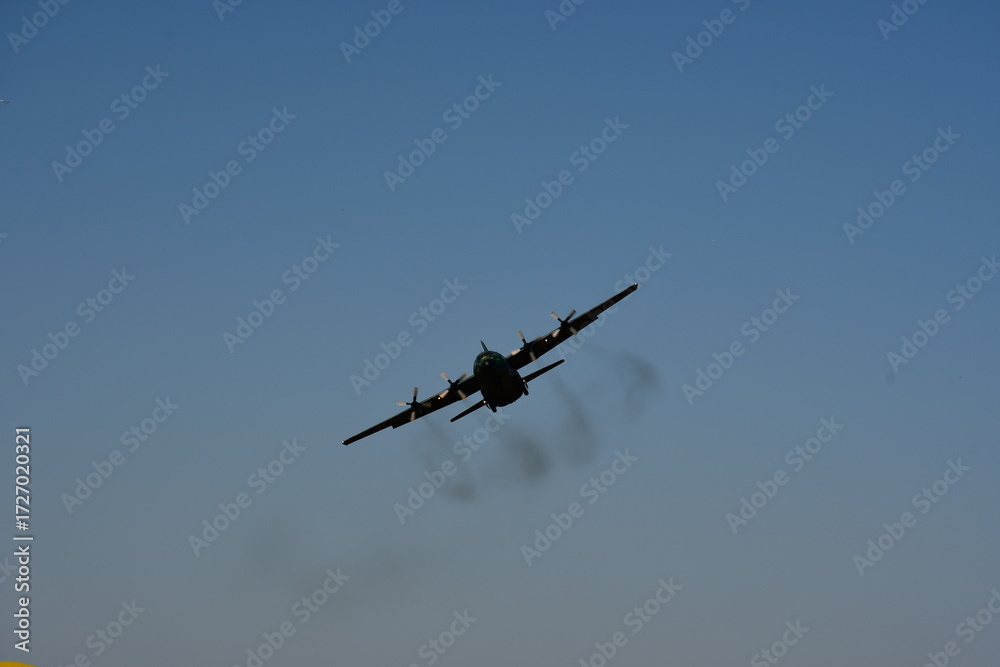 Fototapeta premium Hercules aircraft flying in the sky