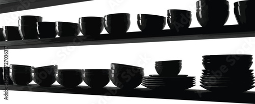 Dark ceramic bowls and plates, stacked on shelves, kitchenware concept