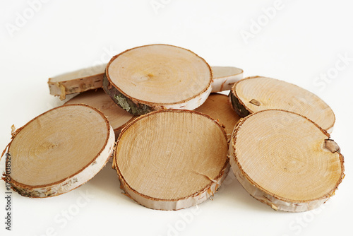 Wooden birch rings in a pile isolated
