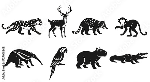 A collection of eight animal silhouettes, each with unique characteristics and shapes. This diverse group captures the beauty of wildlife in a stylish, monochromatic way Vector illustration