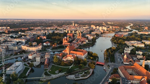 Golden Hour Aerial View of Ostrów Tumski in Wrocław with Gothic Cathedral, Tumski Bridge and Historic Architecture by the Oder River, Poland