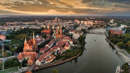 Golden Hour Aerial View of Ostrów Tumski in Wrocław with Gothic Cathedral, Tumski Bridge and Historic Architecture by the Oder River, Poland