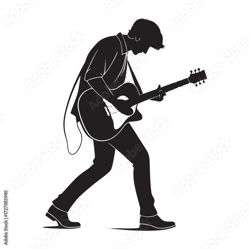 Silhouette of a Guitarist Playing an Electric Guitar