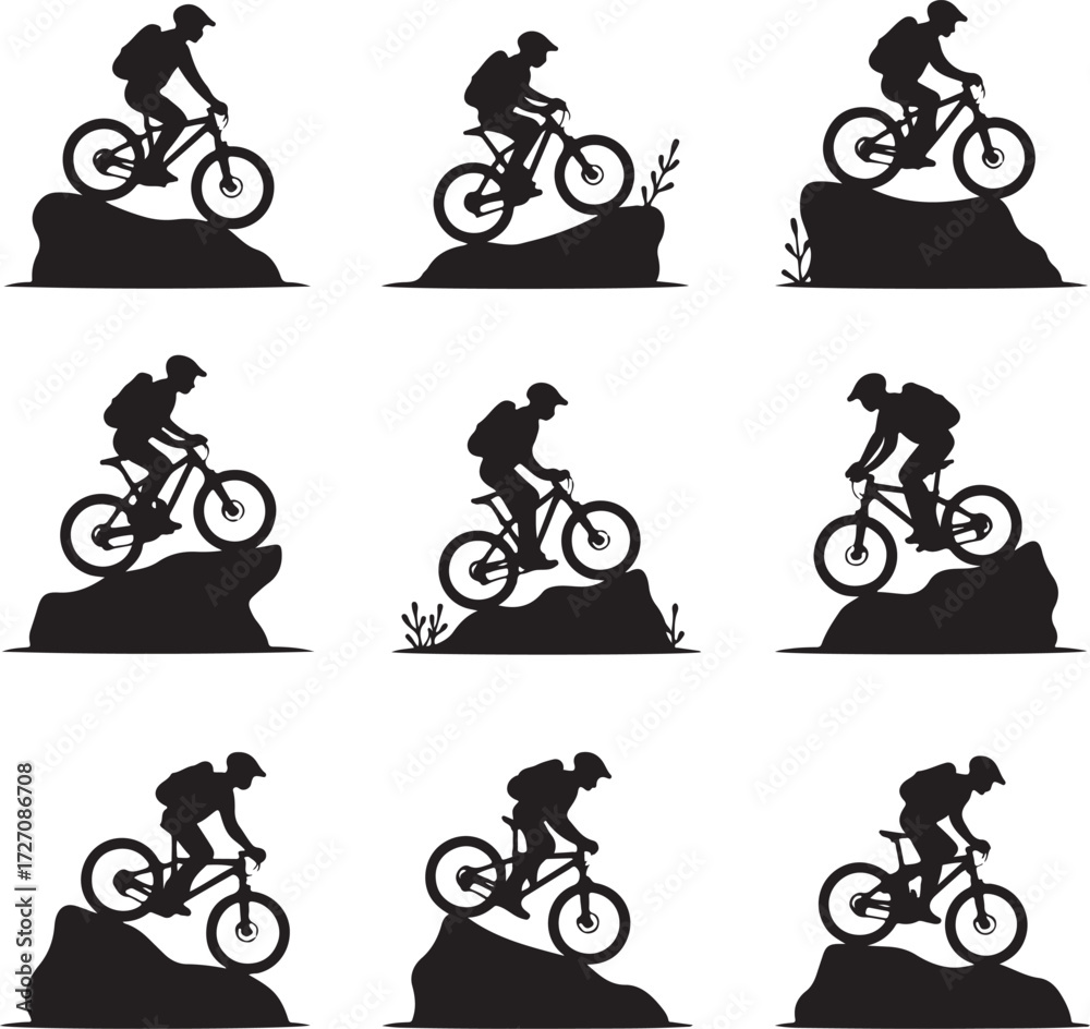 Obraz premium Black silhouette of mountain biker on rocky terrain