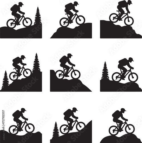 Mountain biker silhouettes on rocky terrain with trees