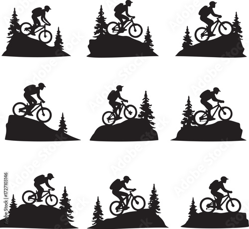 Mountain biker silhouettes on rocky terrain with trees