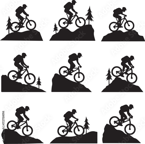 Mountain biker silhouettes on rocky terrain with trees