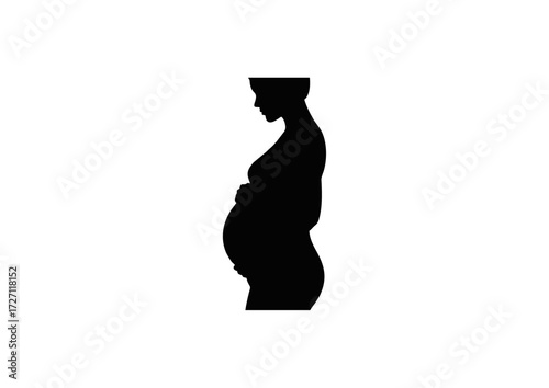 Silhouette of a pregnant woman standing in profile, representing maternity and new life.