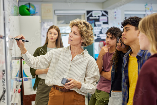 Wallpaper Mural High school teacher giving lesson to multiethnic students Torontodigital.ca