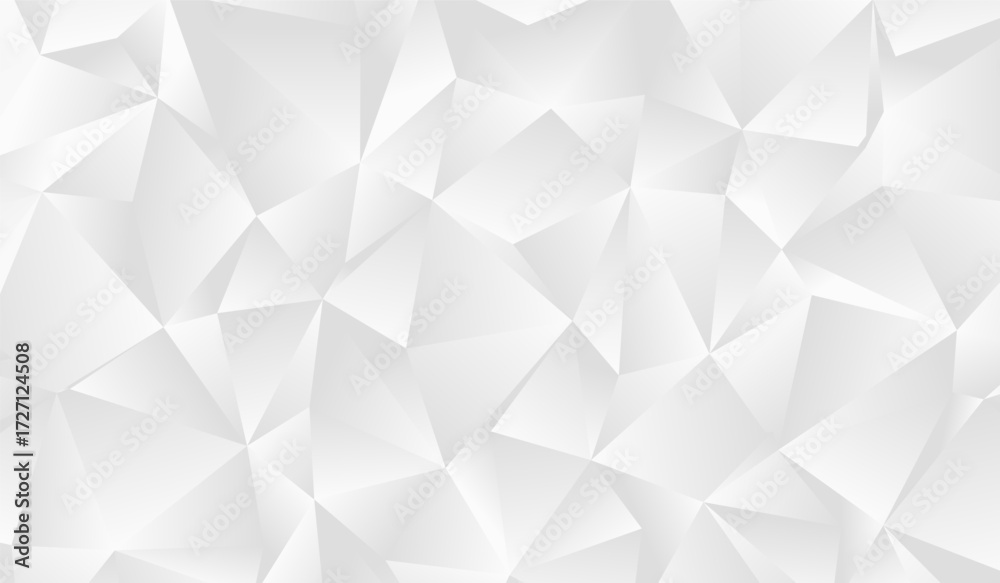 Obraz premium A vibrant composition of overlapping triangles and polygons in varying shades showcasing a captivating interplay of light and shadow.