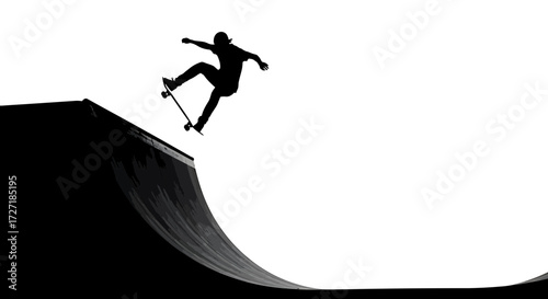 Silhouette of a skateboarder performing an aerial trick over a ramp against a stark white background