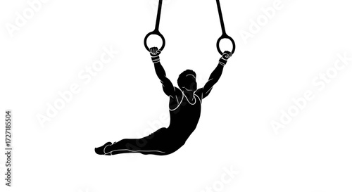 Silhouette of a male gymnast performing an athletic maneuver on gymnastic rings during a competition or training session