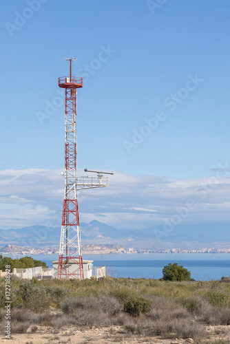 Border guard. A surveillance system for coastal and terrestrial supervision. SIVE system technologies in Alicante, Spain. Marine radar tower monitoring maritime zones and intercepting potential danger