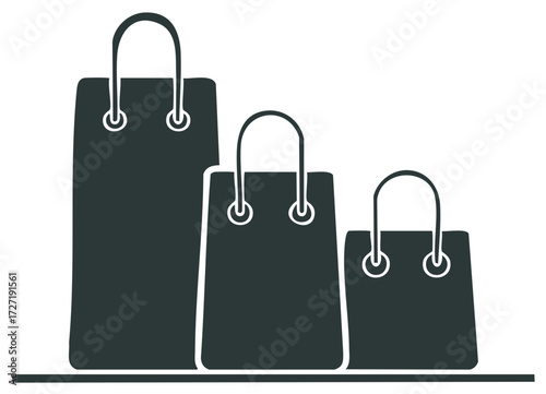 Various shopping bags in different sizes for merchandise and advertising. Group of shopping totes on display on the floor.