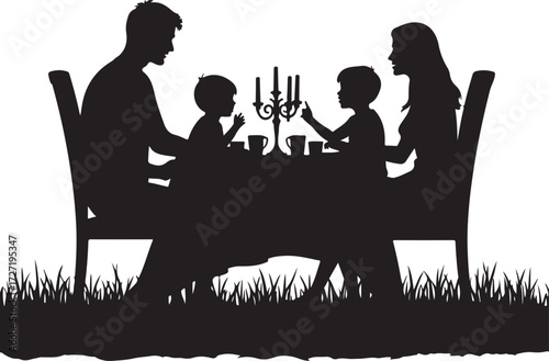 Family silhouette dining at table with candelabra and grass