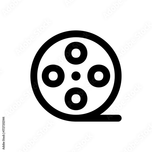 A simple black and white icon depicting a film reel with four circular openings and a trailing film strip