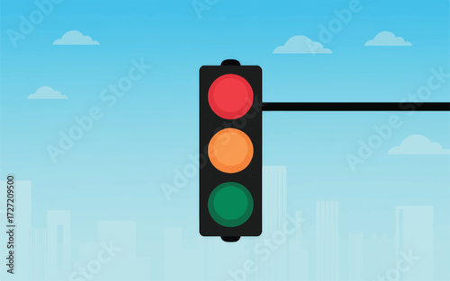 Traffic Light with Red, Yellow, and Green Lights Against a Blue Sky and Cityscape signal stoplight