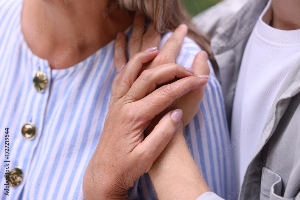 Fototapeta premium Mother and her son, closeup. Family bonding