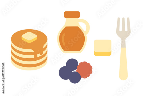 Delicious golden pancakes with maple syrup, fresh blueberries, raspberry, and butter arranged for a sweet breakfast meal