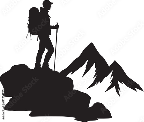 Silhouette hiker with backpack and poles on rocky outcrop near mountains