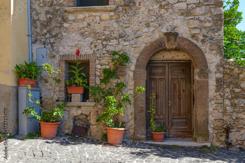 Facade of an old house in the medieval district of Monte San Giovanni Campano, a small town in Lazio, Italy.