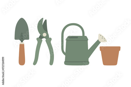 Gardening tools display with watering can and pot ready for planting in the spring season