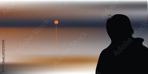 silhouette of man on a beach at sunset time