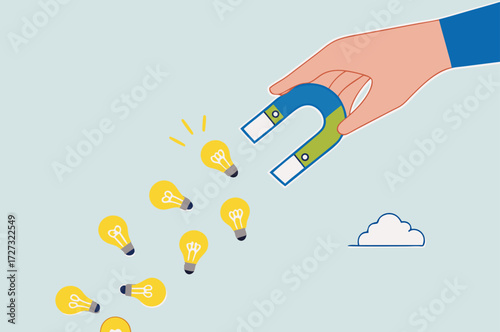 businessman with magnet to magnetize light bulb ideas.