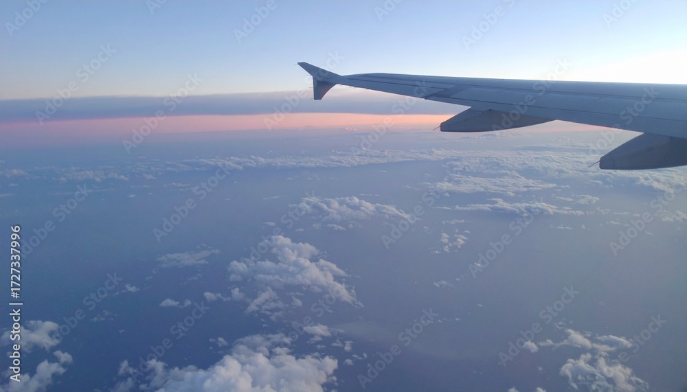 Obraz premium Airplane Wing View Clouds, Sky, Sunset, Aerial, Flight, Horizon, Travel, Altitude, Journey, Pastel