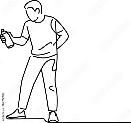 Man holding a spray can ready to create street art on a