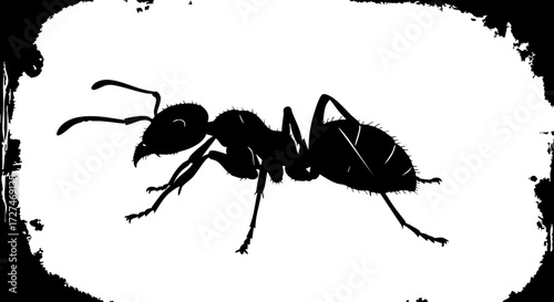 Striking silhouette of a single ant in motion, symbolizing hard work, teamwork, and natural resilience for impactful designs.