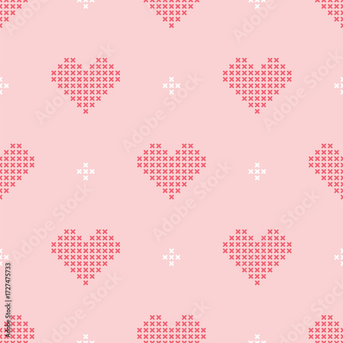 Pink and white cross-stitch hearts making a cute seamless pattern for love concepts