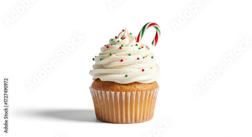 Christmas cupcake with candy cane frosting and sprinkles holiday dessert sweet treat bakery isolated photo