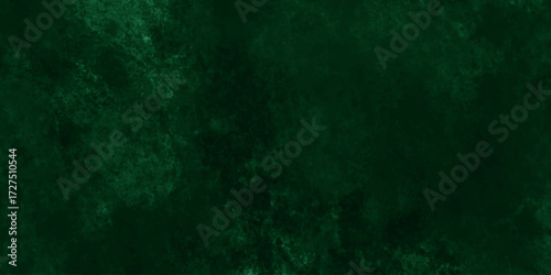 Abstract Elegant dark green background with mottled vintage texture in old fancy background design, texture of colored parchment paper.