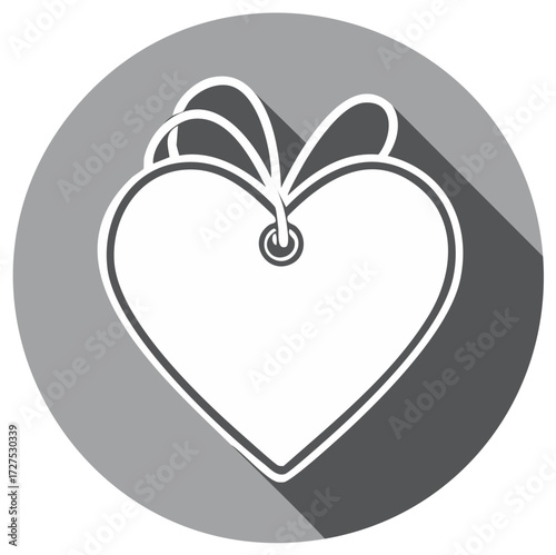 Iconographic heart shape tag with hanging string and grey circle backdrop representing love and affection
