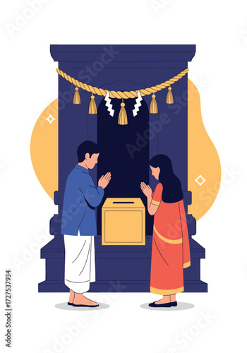 A couple offers prayers at a traditional Hindu altar.