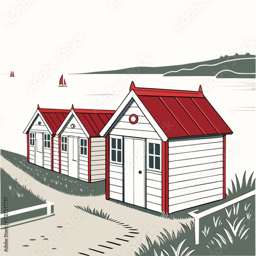 Charming row of white beach huts with red roofs on a grassy embankment overlooking the sea