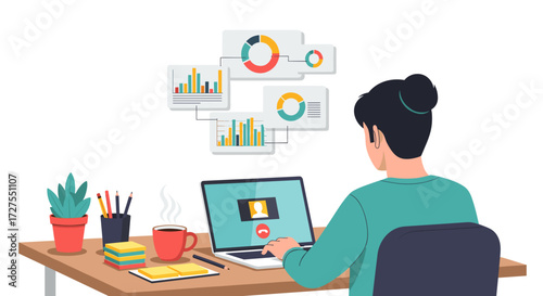 Woman working at desk with laptop and data charts overhead view