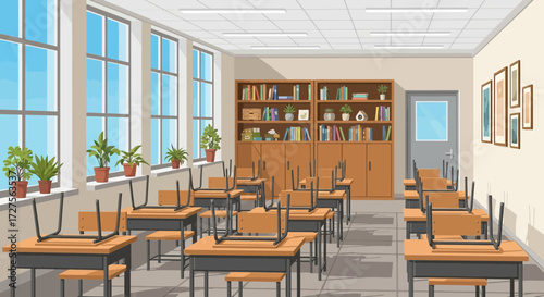 An empty classroom with desks and chairs neatly arranged, bathed in natural light streaming through large windows, with bookshelves filled with books lining the wall