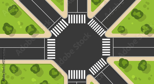 An aerial view of a busy road intersection with multiple crosswalks and surrounding green spaces, illustrating urban transportation