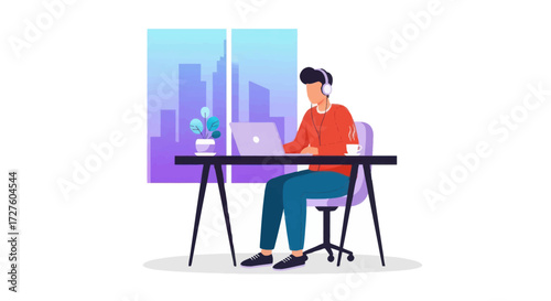 Young man working remotely on laptop at desk wearing headphones in a modern office setting.