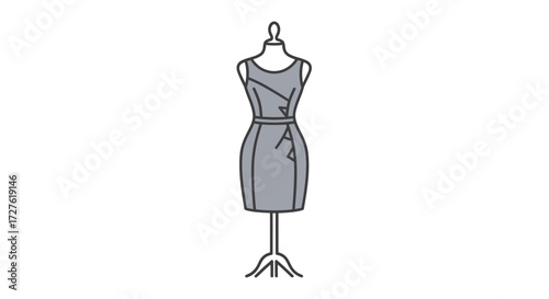 Elegant Gray Dress Displayed on a Tailors Mannequin.