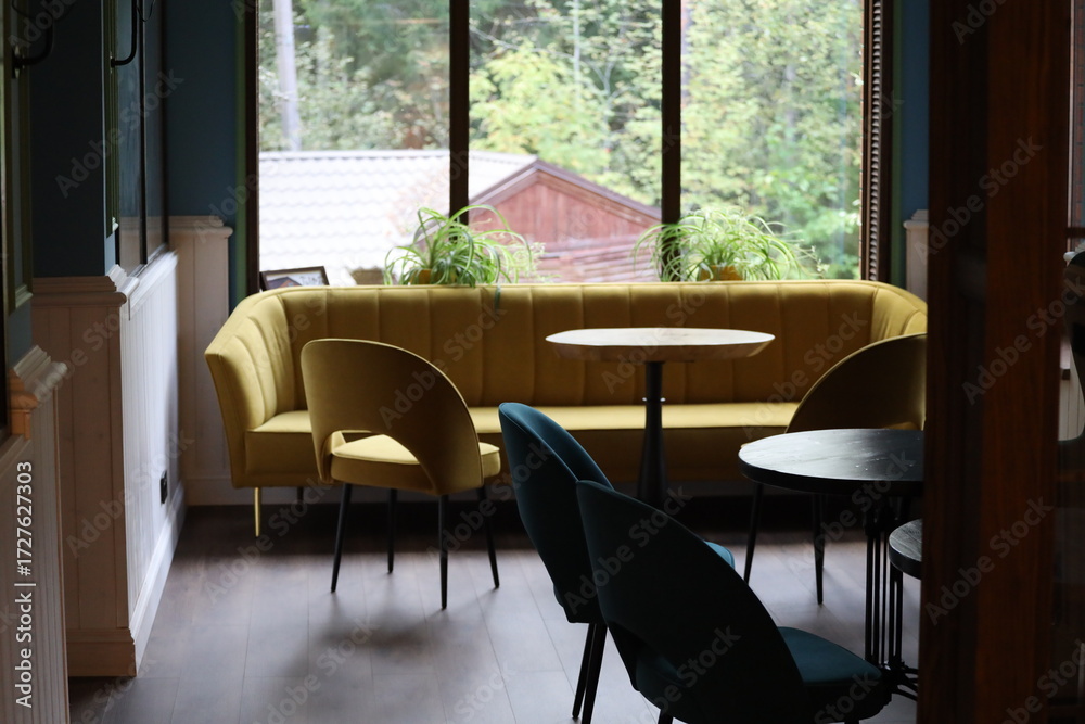 Fototapeta premium A comfortable living room setup with a couch and table