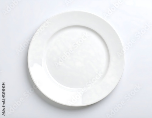 Empty white plate on white background